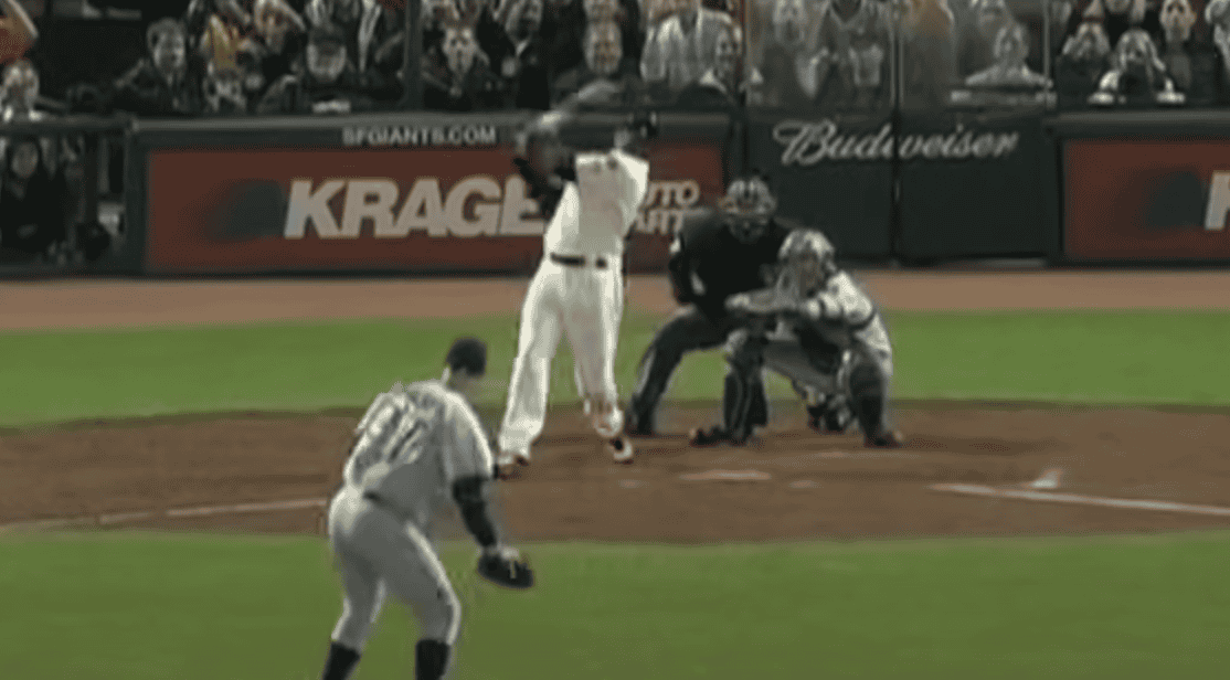 Barry Bonds celebrates hitting his 756th home run, a key moment in baseball history.
